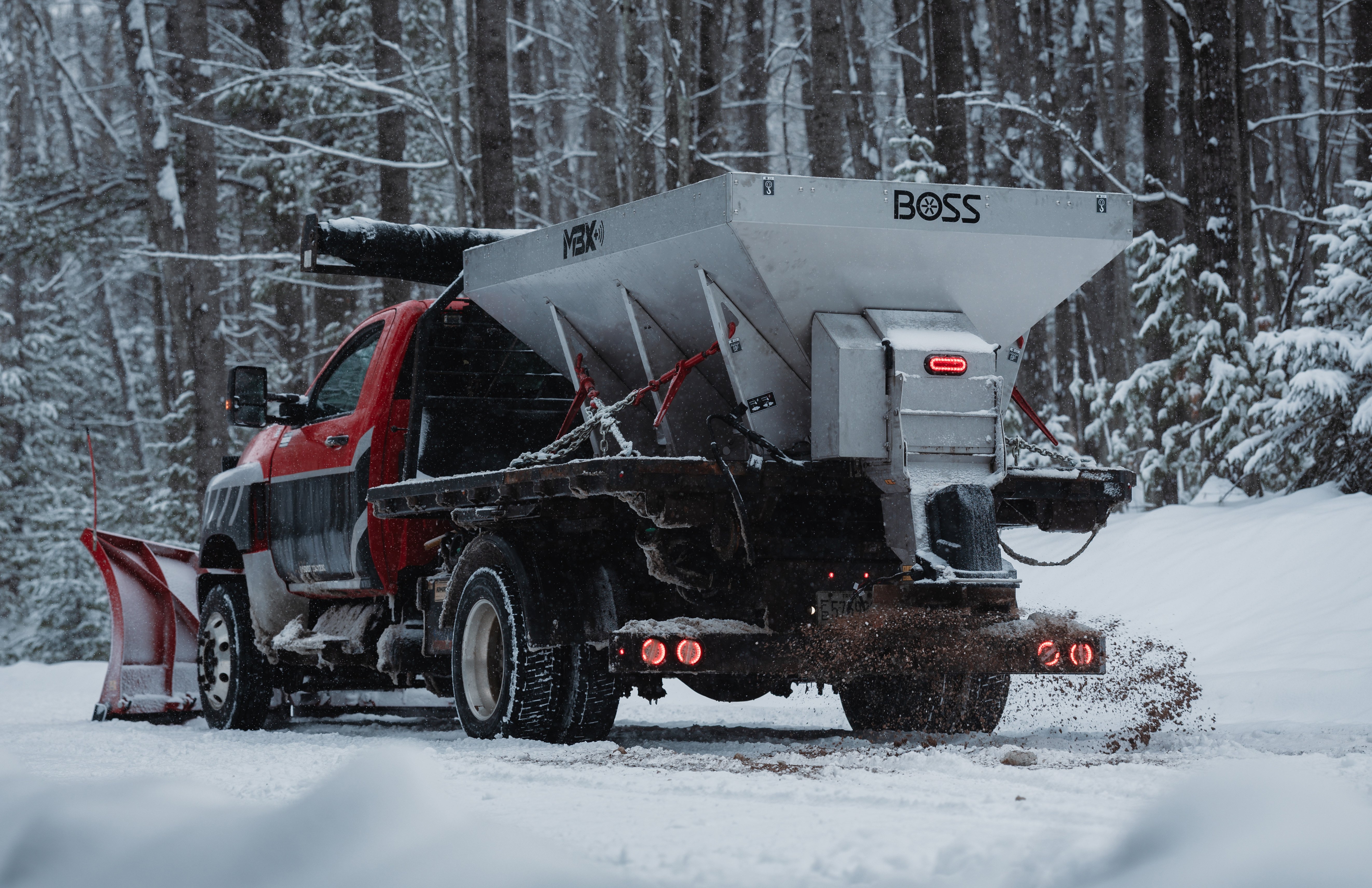 BOSS MBX+ hopper spreader mounted on a truck