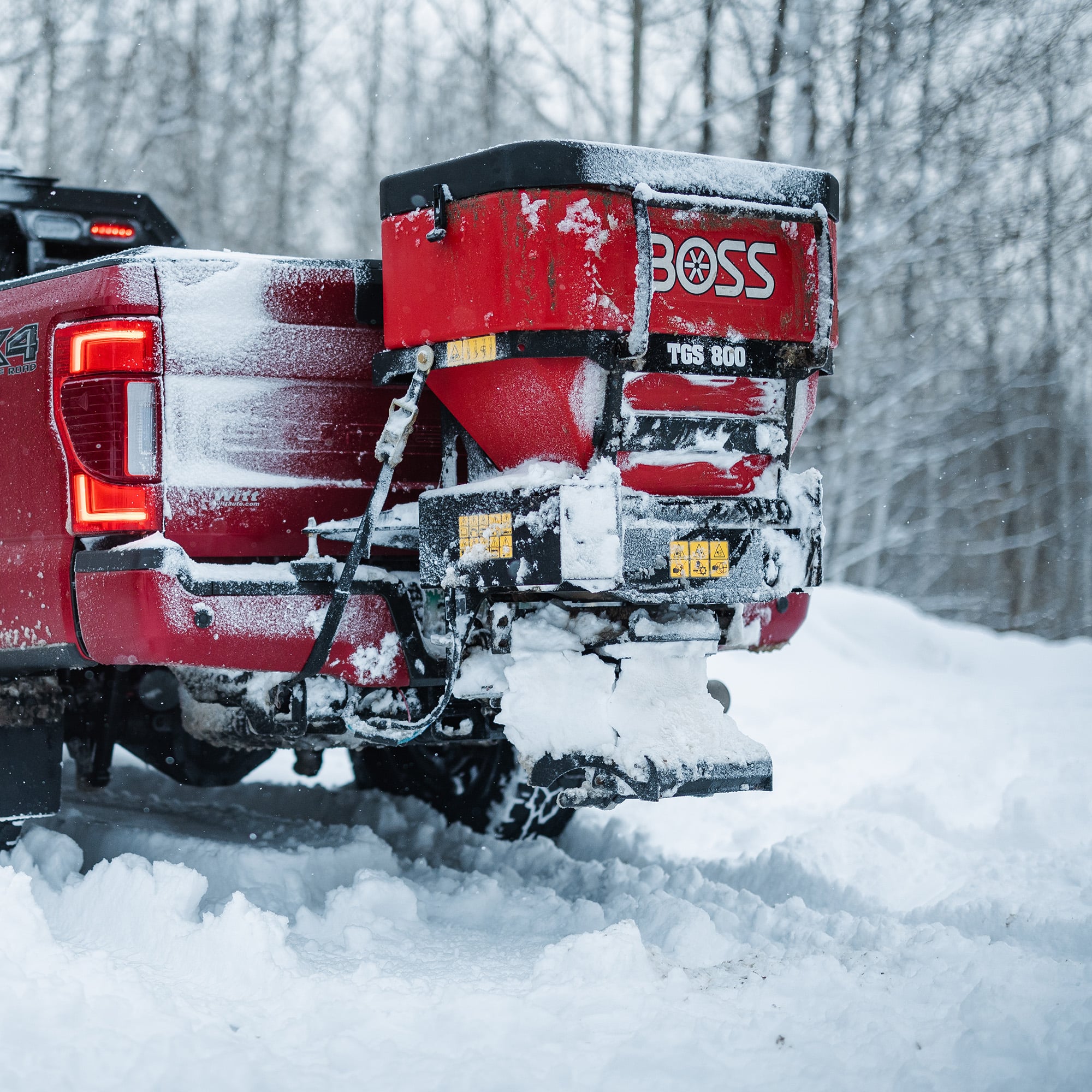 BOSS TGS tailgate spreader mounted on a pickup truck